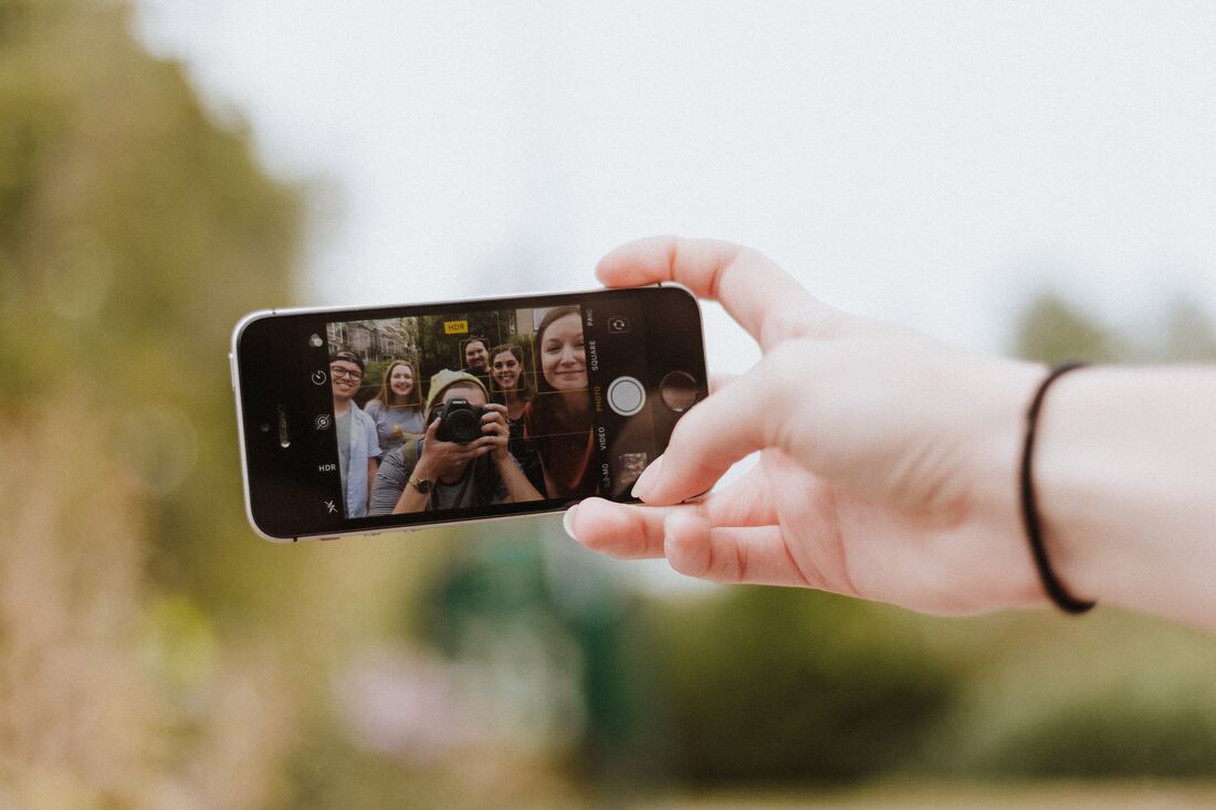 group of women taking a selfie 